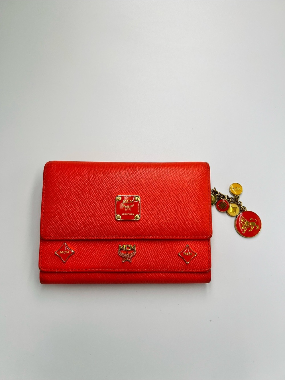 MCM Leather Trifold Wallet with Gold Charm Accents